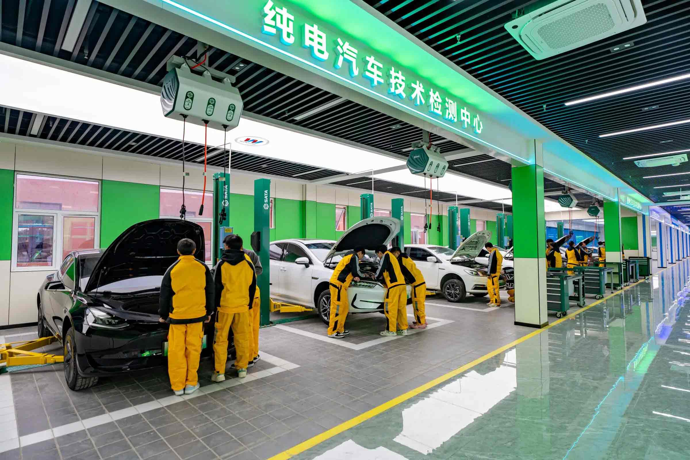 Warehouse stock of spare parts for Chinese electric vehicles ready for global distribution.